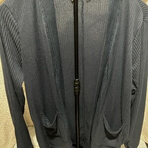 Women’s blue cardigan with ruffle bottom design